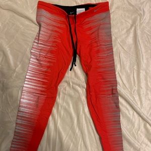 Nike, size small, bright red workout pants.